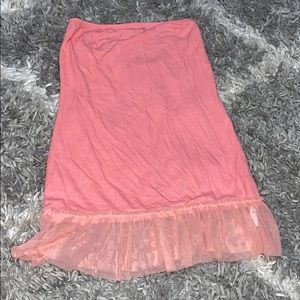 Pink sleeveless top with ruffles